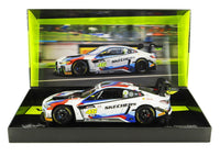 BMW M4 GT3 scale model car by Vroomi, featuring Skechers livery and racing decals in display box