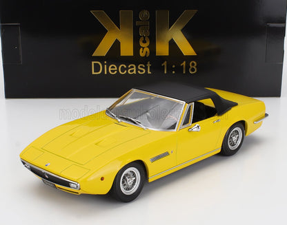 Yellow 1:18 scale diecast classic sports car model with black roof, available on Vroomi