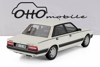 White Peugeot 505 V6 model car displayed with Otto Mobile logo, also accessible on Vroomi