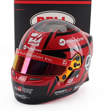 Charles Pozzi Haas F1 helmet scale model car collectible by Vroomi, featuring MoneyGram and Bell branding