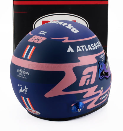 Blue and pink racing helmet with Atlassian and Bell logos, scale model car accessory at Vroomi