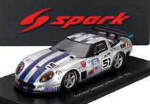 1/43 scale Corvette Callaway Le Mans 24H 1994 die-cast model with racing decals, silver body, blue stripe, available at Vroomi
