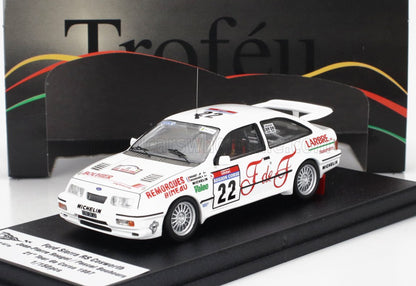 White Ford Sierra RS Cosworth model car with racing decals on display, offered on Vroomi