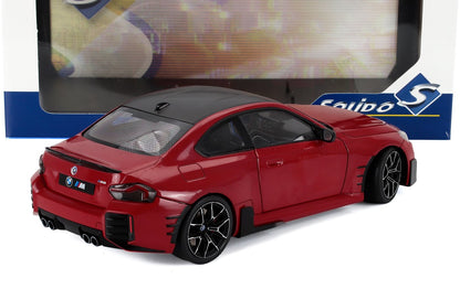 Red BMW M2 model car with black roof and detailed rims, displayed with Solido packaging, available on Vroomi