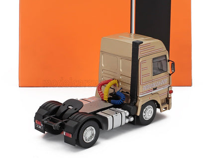 Die-cast scale model truck cab in gold with TurboLeader decals, available at Vroomi