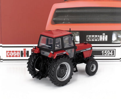Detailed scale model of a red Case International 1594 tractor with black tires, showcased with box background, available at Vroomi