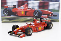 Coche a escala Ferrari F1 rojo con logos de Marlboro, Shell y Asprey, presentado por Vroomi