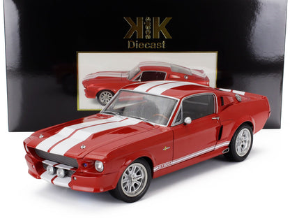 Red GT500 diecast model car with white racing stripes, detailed wheels, and packaging behind, available through Vroomi