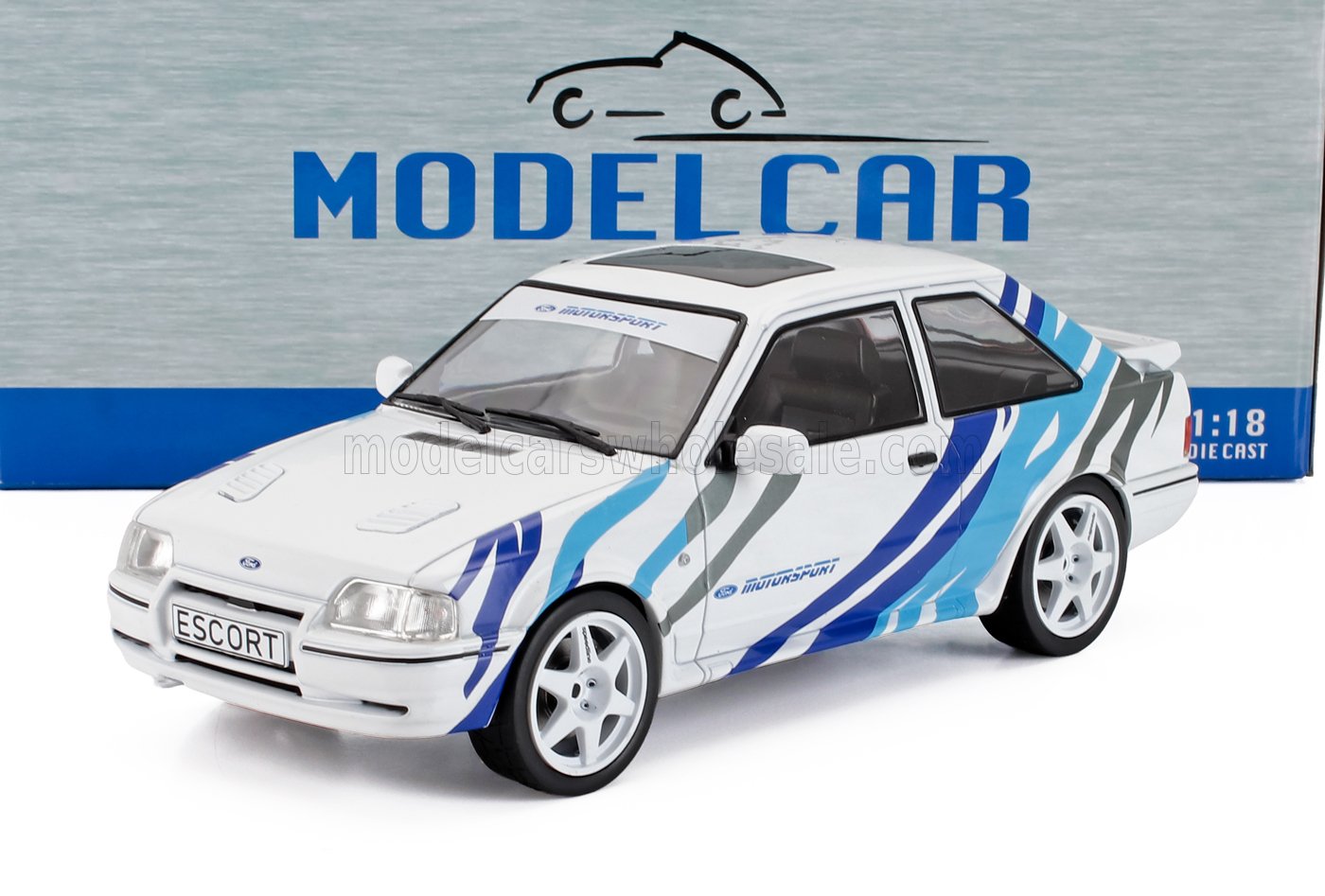 White Ford Escort model car with blue and gray racing stripes, detailed replica available at Vroomi