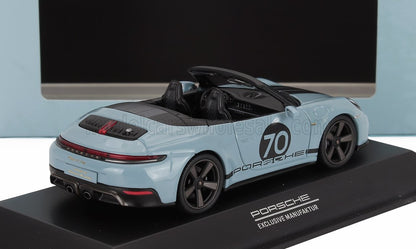 Light blue Porsche 911 Targa 4S model car with black interior, number 70 decal, shown on display stand, now offered on Vroomi