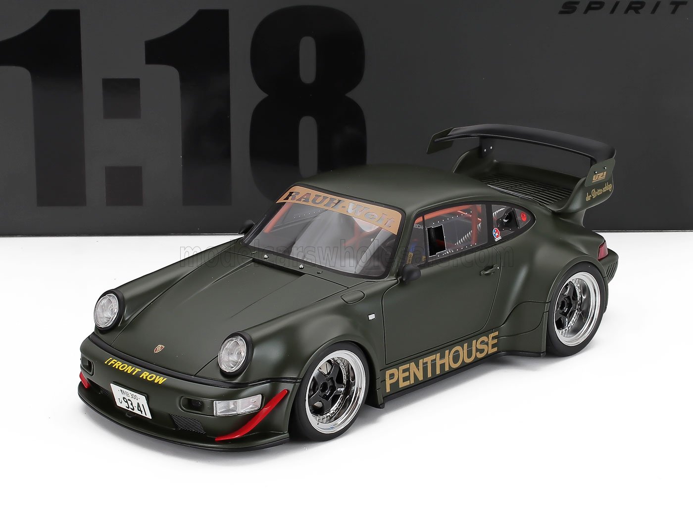 Matte green 1:18 scale Porsche 911 model with Rauh-Welt and Penthouse decals, wide body kit, and large rear wing, available at Vroomi