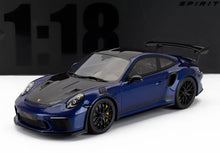 1:18 scale model of a blue Porsche 911 GT3 RS with black hood and spoiler, available at Vroomi