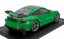 Green Porsche 911 GT3 1/18 scale diecast model car on black display base available at Vroomi