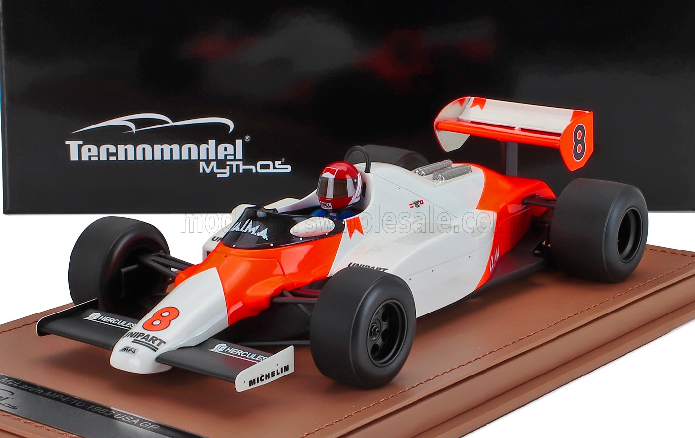 Tecnmodel Mythos McLaren MP4-1C 1983 USA GP model car in white and orange, available on Vroomi