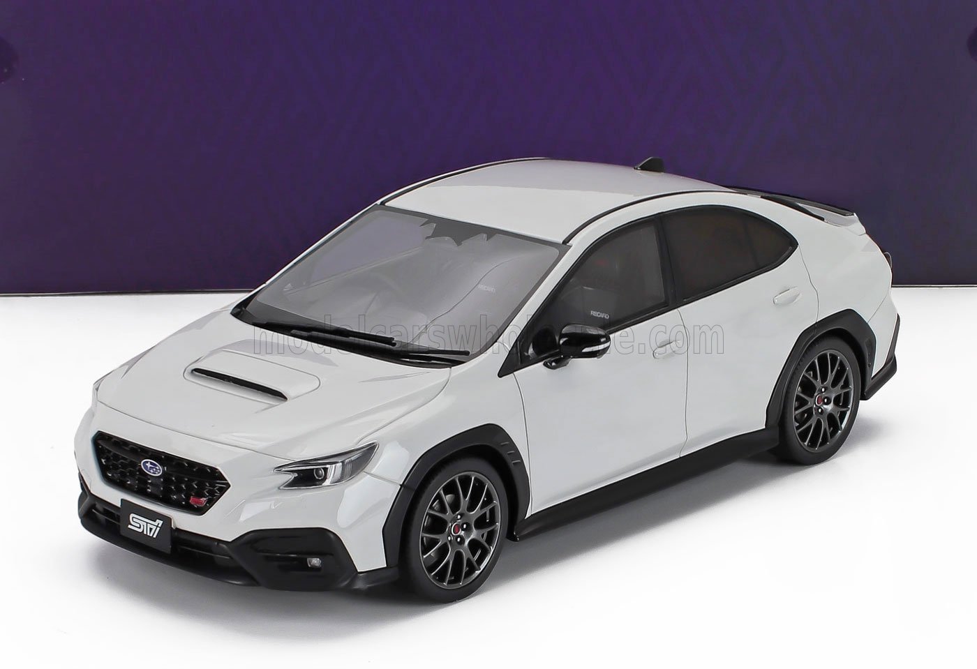 White Subaru WRX STI scale model car, detailed die-cast replica, available at Vroomi