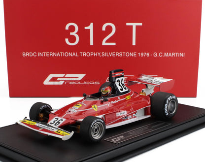 Model of 1976 Ferrari 312 T Formula 1 car with driver figure, on display platform, offered on Vroomi