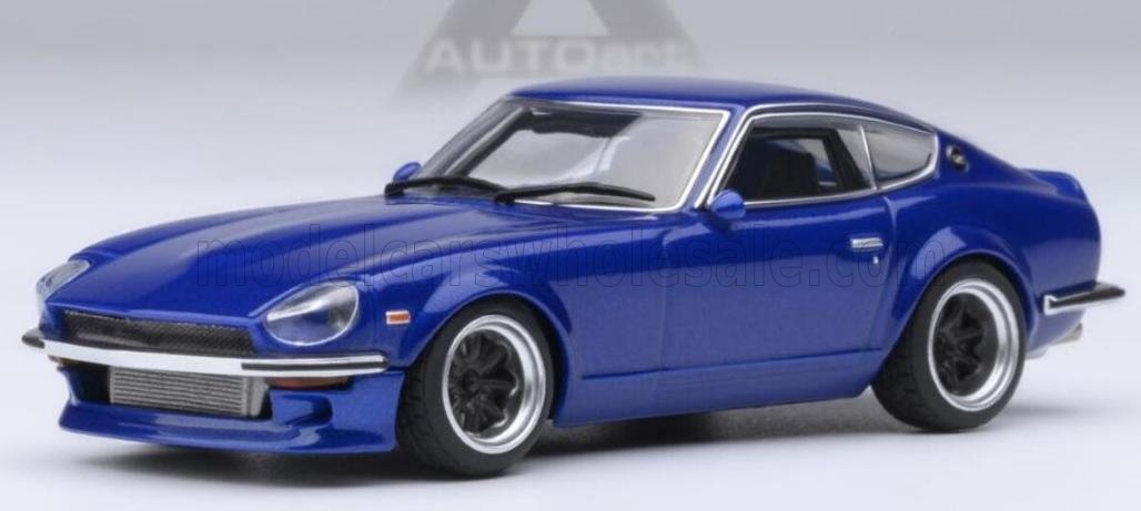 Blue classic sports car model with wide tires and black rims, now available through Vroomi