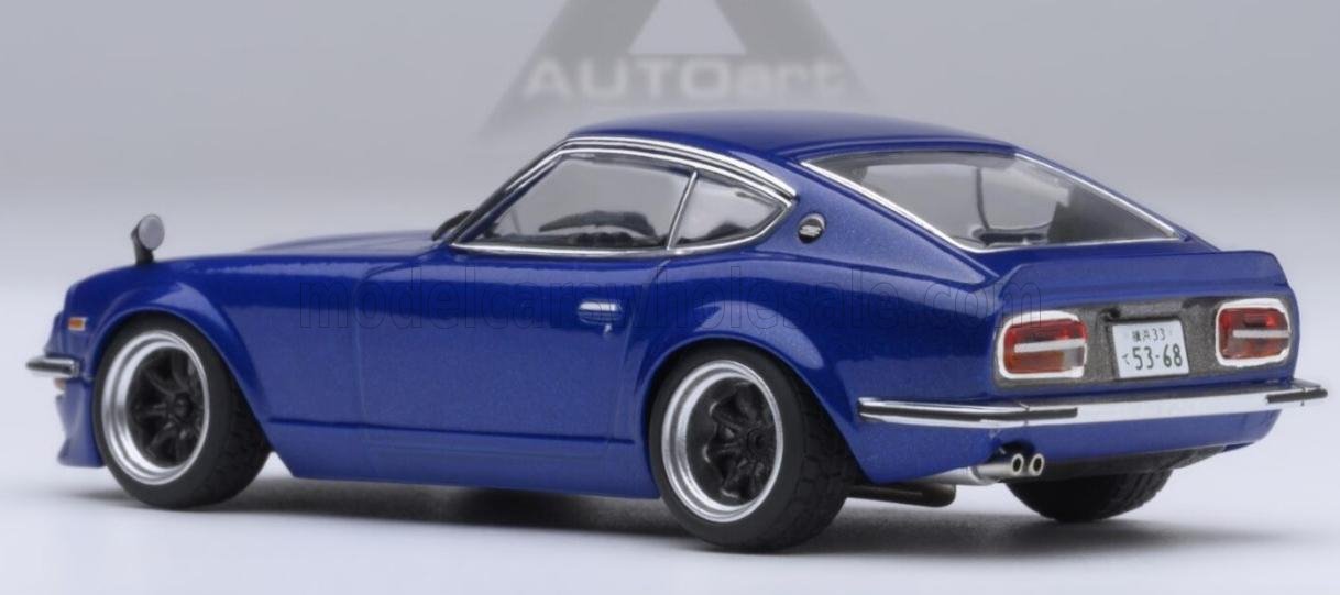 Blue classic 1970s sports car model with black wheels, chrome accents, and Japanese license plate, available on Vroomi