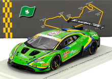 Green Lamborghini Huracán GT3 EVO2 model with racing decals displayed on a stand with Macau track map, available at Vroomi