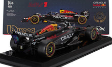 1/24 scale Red Bull Oracle F1 car model with Pirelli tires and Red Bull branding, offered on Vroomi