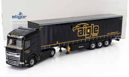 DAF - XG Vrachtwagen met laadbak en Tautliner-oplegger van Aigle Group 2022 - Zwart/Geel - Vroomi