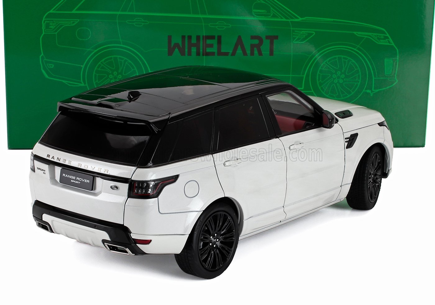 Modellino in scala 1/18 della Range Rover bianca con tetto nero, disponibile su Vroomi.