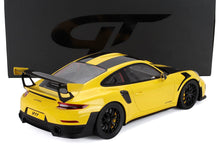 Yellow 1/18 scale Porsche 911 GT2 RS model car with large rear wing, available at Vroomi.