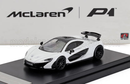White and black McLaren P1 model car on display stand, available for purchase on Vroomi