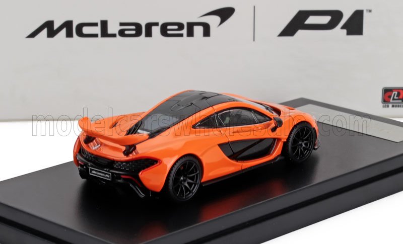 Orange McLaren P1 scale model on display stand, available now on Vroomi platform