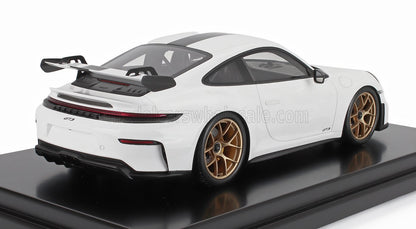White Porsche 911 GT3 model car with gold wheels and rear wing on display, available on Vroomi