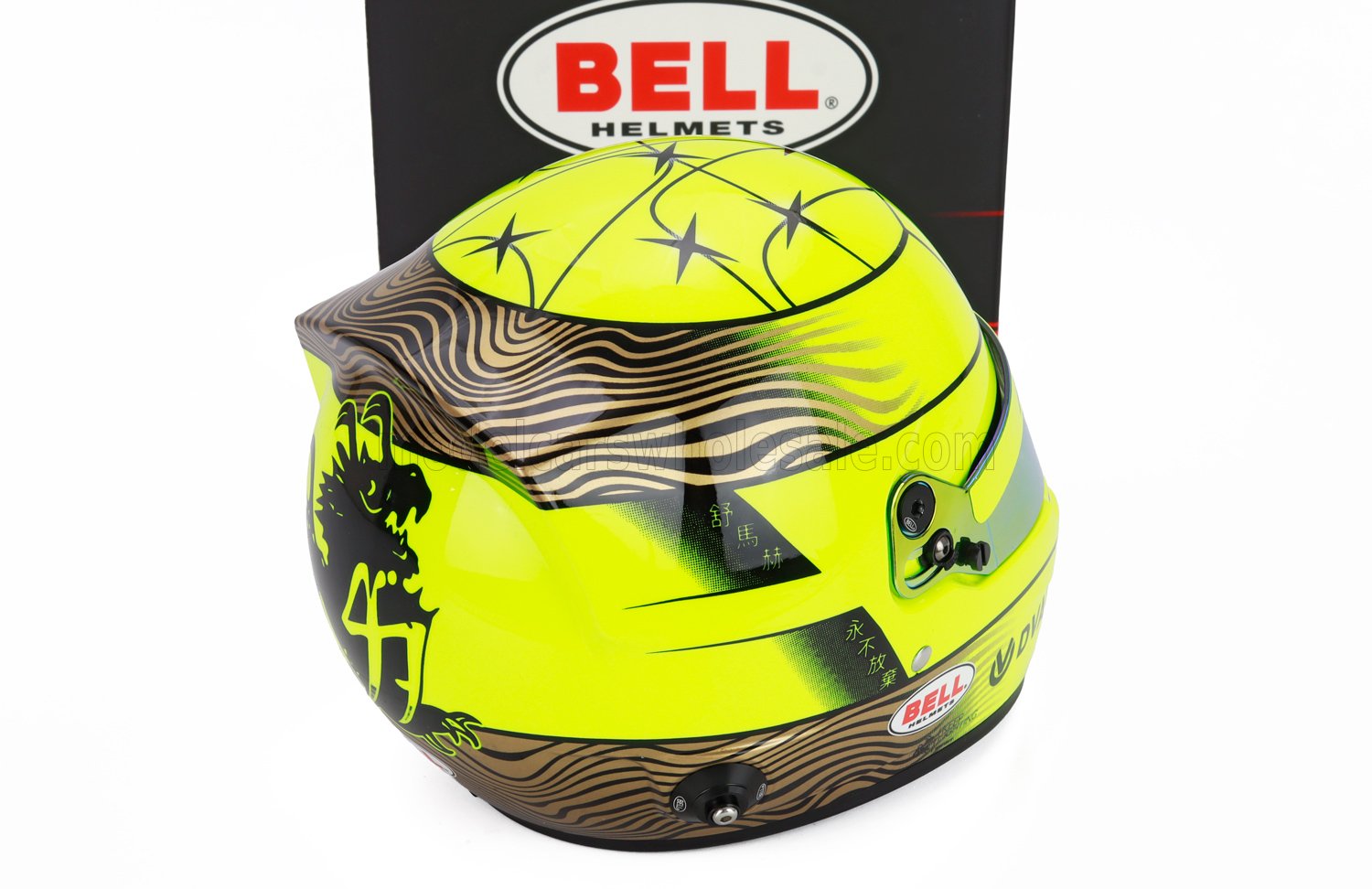 Vroomi scale model car helmet with neon yellow and black design, Bell Helmets branding