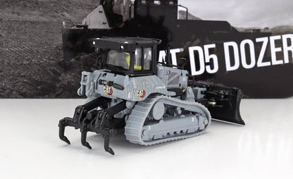 Gray CAT D5 bulldozer model with black ripper attachment displayed on white surface, available on Vroomi