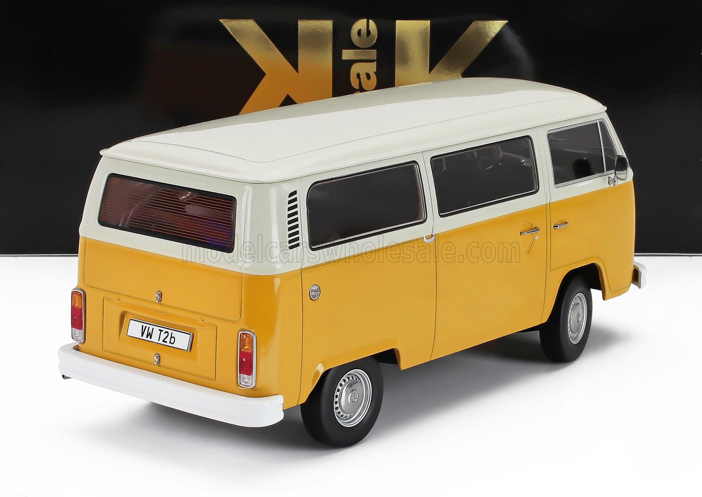Yellow and white VW T2b camper van scale model with detailed features, available on Vroomi