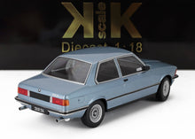 1/18 scale diecast BMW 323i blue model car rear side view available at Vroomi