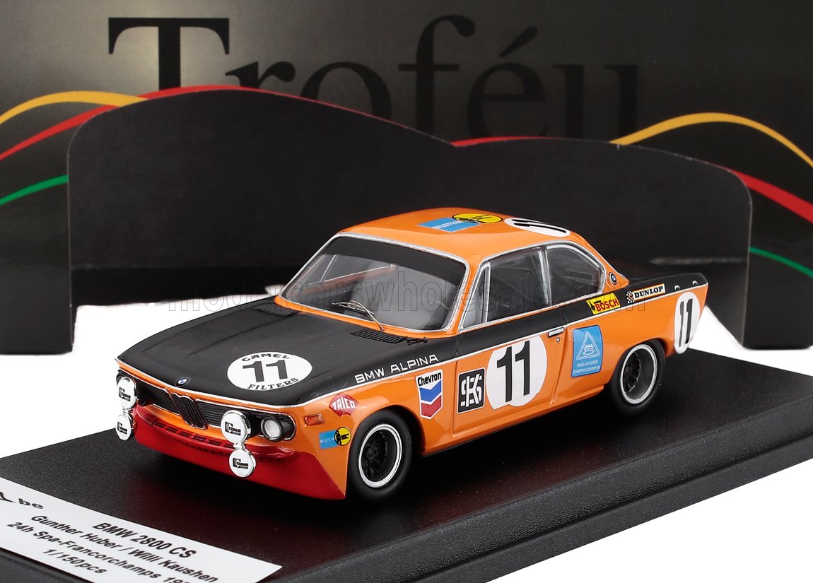 Orange and black BMW 2800 CS scale model car, race #11, displayed on Vroomi collector base