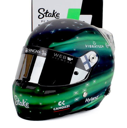 Vroomi scale model car driver helmet with Stake, Hyland, and Singha branding, featuring aurora green design