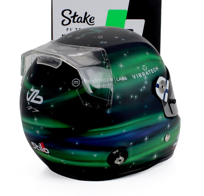 Vroomi scale model car helmet with aurora design, Stake F1 branding, and Stilo details