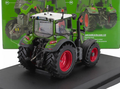 Detailed green and red Fendt scale model tractor on black display stand, available at Vroomi