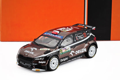 Detailed 1:43 scale Orlen-sponsored Škoda rally car model with white wheels and red-black livery, also available via Vroomi