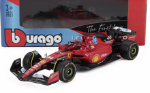 Red Ferrari F1 model car by Bburago with sponsor logos, displayed with packaging, available on Vroomi