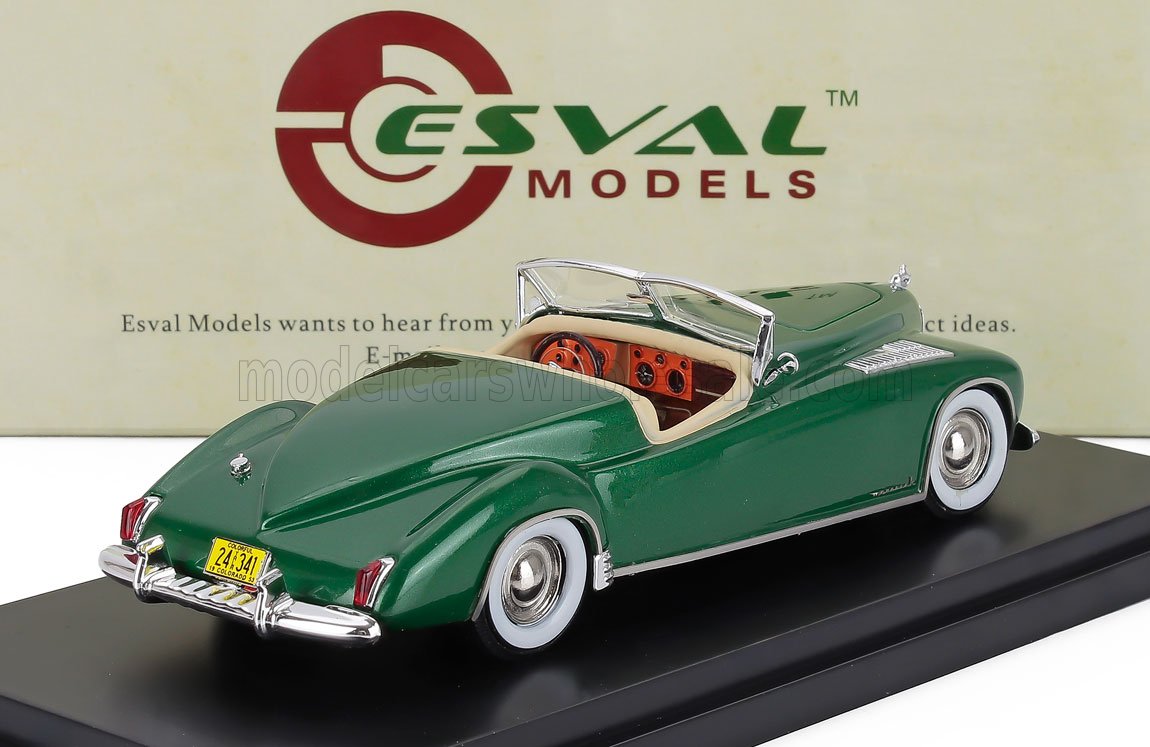 Green vintage convertible model car with whitewall tires displayed on black base, offered on Vroomi