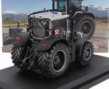 Detailed 1/18 scale Massey Ferguson tractor model with rear view, realistic tires, and cabin, available at Vroomi