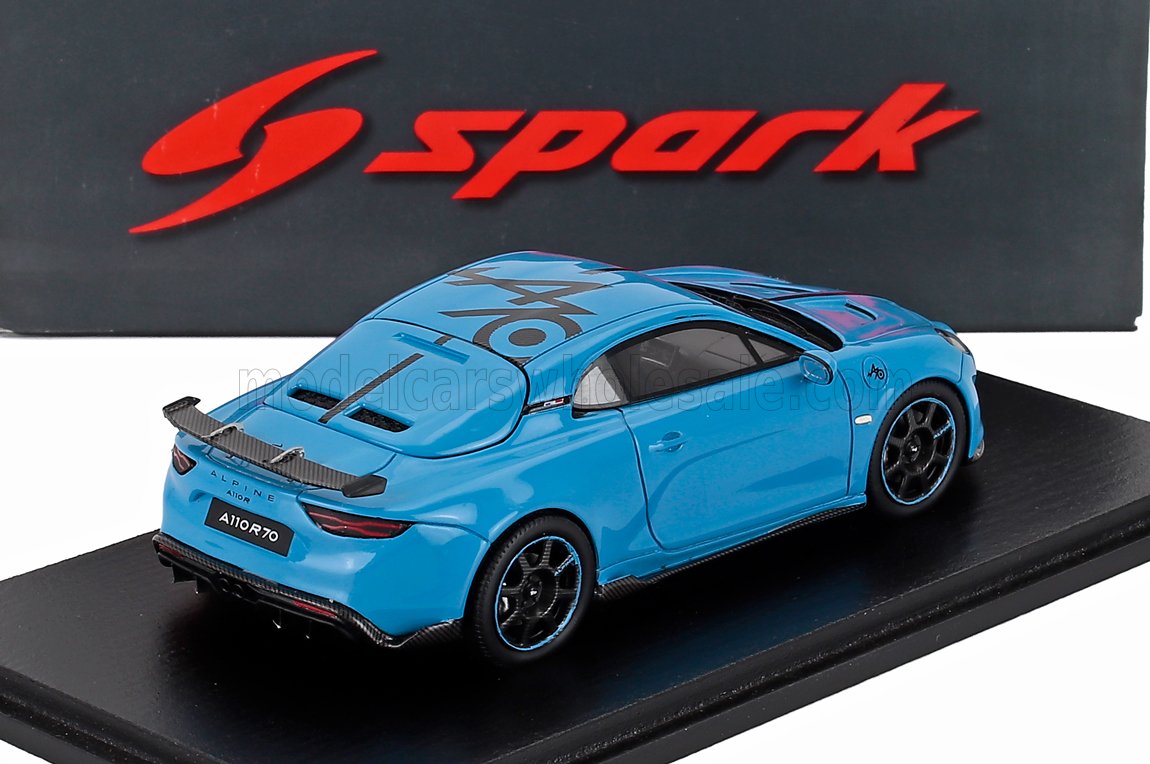 Blue Alpine A110R 1/18 scale model car with black details on display stand, available at Vroomi