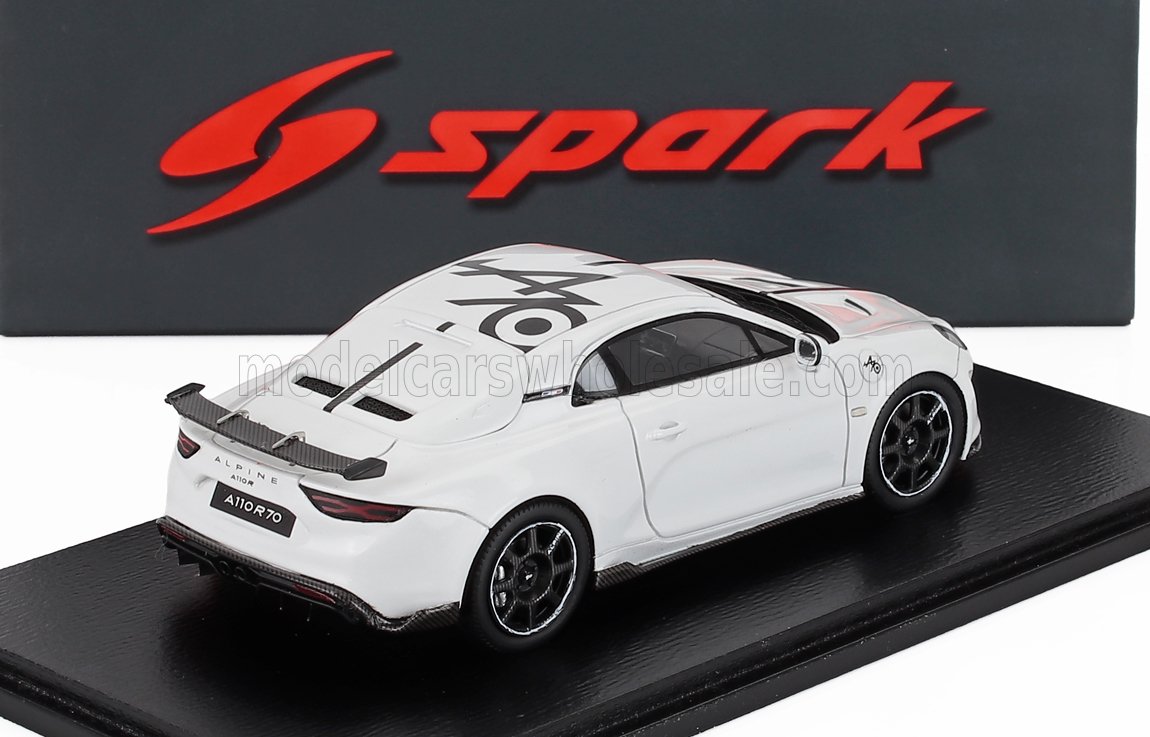 White Alpine A110 R70 die-cast model car on black base with Spark logo, available at Vroomi