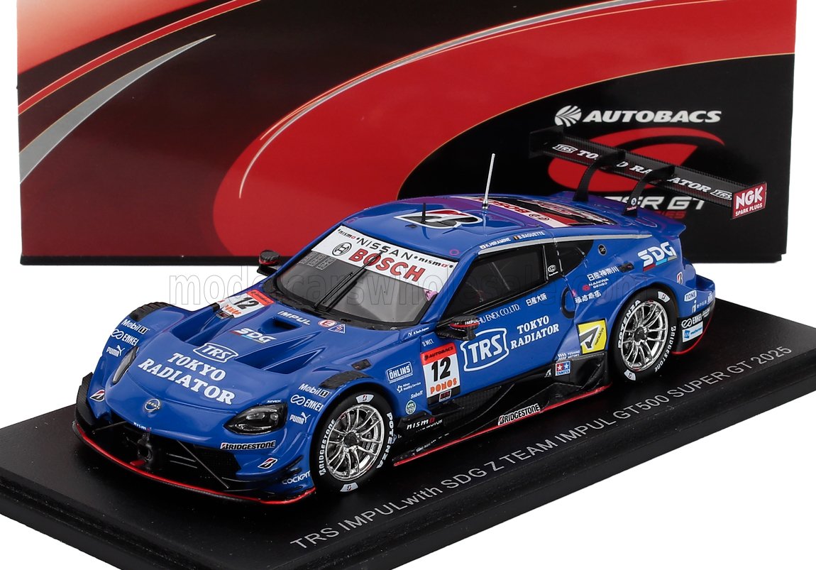 Blue TRS IMPUL Nissan GT500 scale model car with racing decals on display stand, available at Vroomi