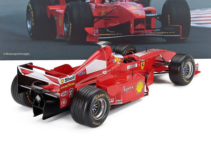 FERRARI - F1 F300 N.º 3 VENCEDORA DO GP DE FRANÇA DE 1998 MICHAEL SCHUMACHER - VERMELHO E BRANCO Modelo em escala no Vroomi