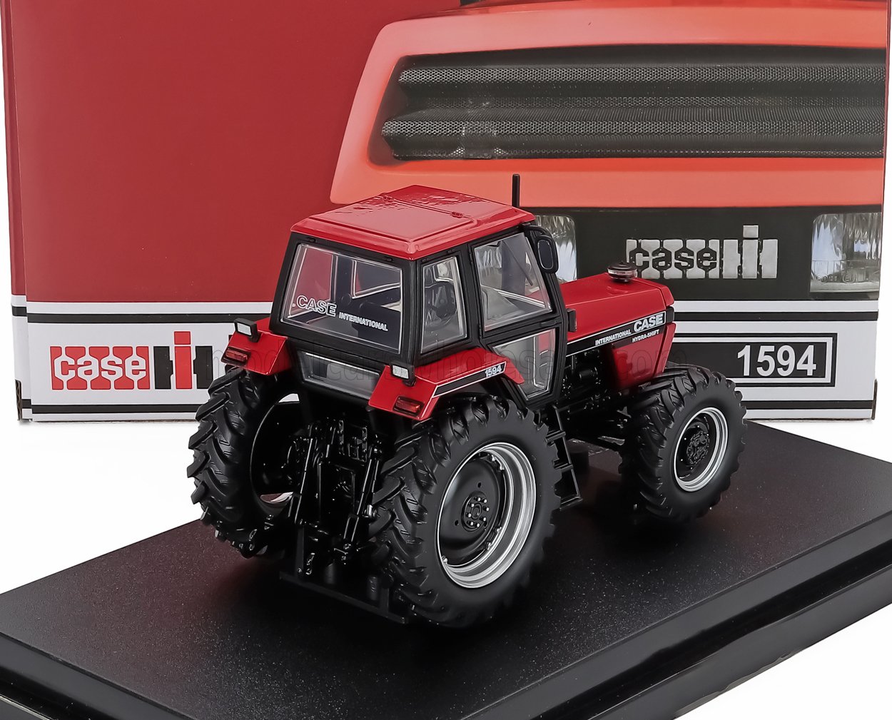 CASE-IH - Tractor 4x4 1594 de 1986 - Rojo y negro. Maqueta de coche en Vroomi
