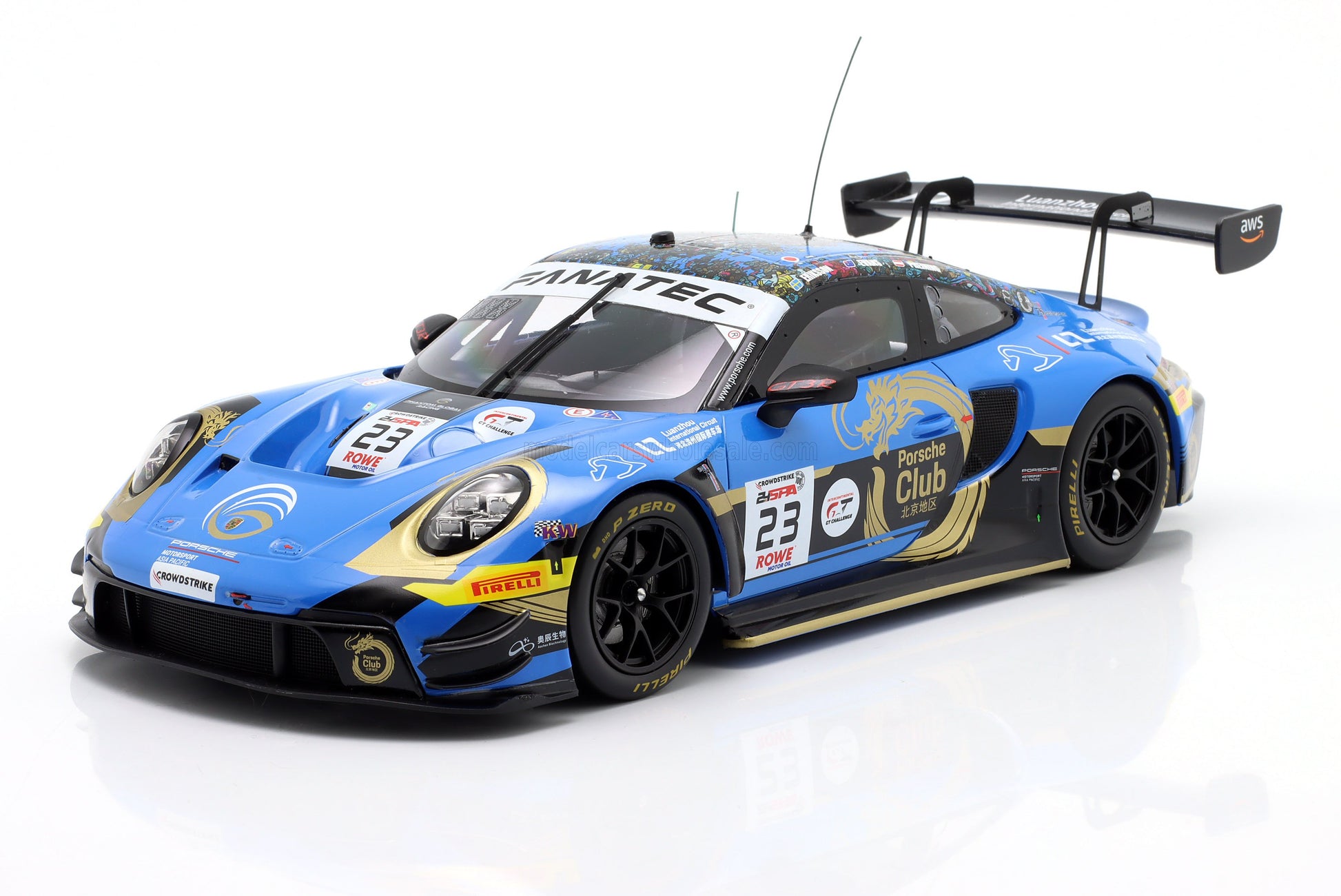 1:18 scale blue Porsche GT3 race car model with gold dragon graphics, available to order online