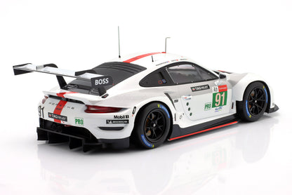 Detailed 1/18 scale Porsche 911 RSR model car in racing livery, currently available online