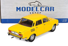 Yellow 1:18 die-cast scale model car by Modelcar Group, perfect for collectors at Vroomi